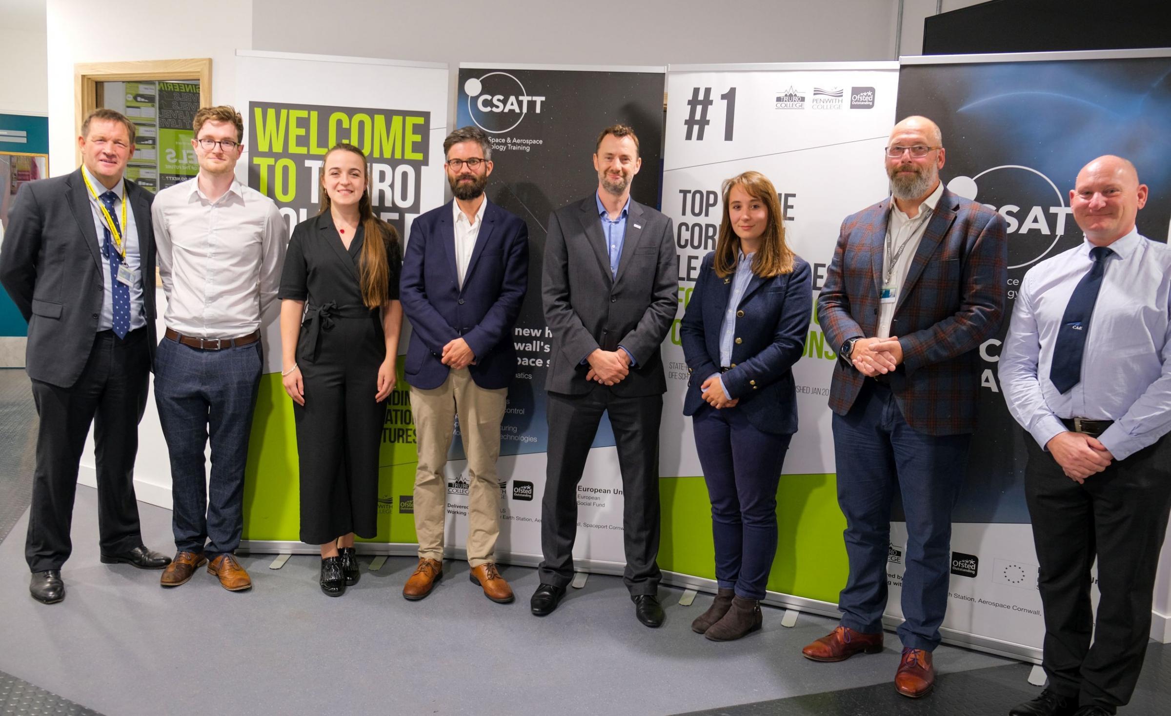 Paul Bate, CEO of the UK Space Agency (centre) with college principal Martin Tucker (left) and the team involved in developing the apprenticeship