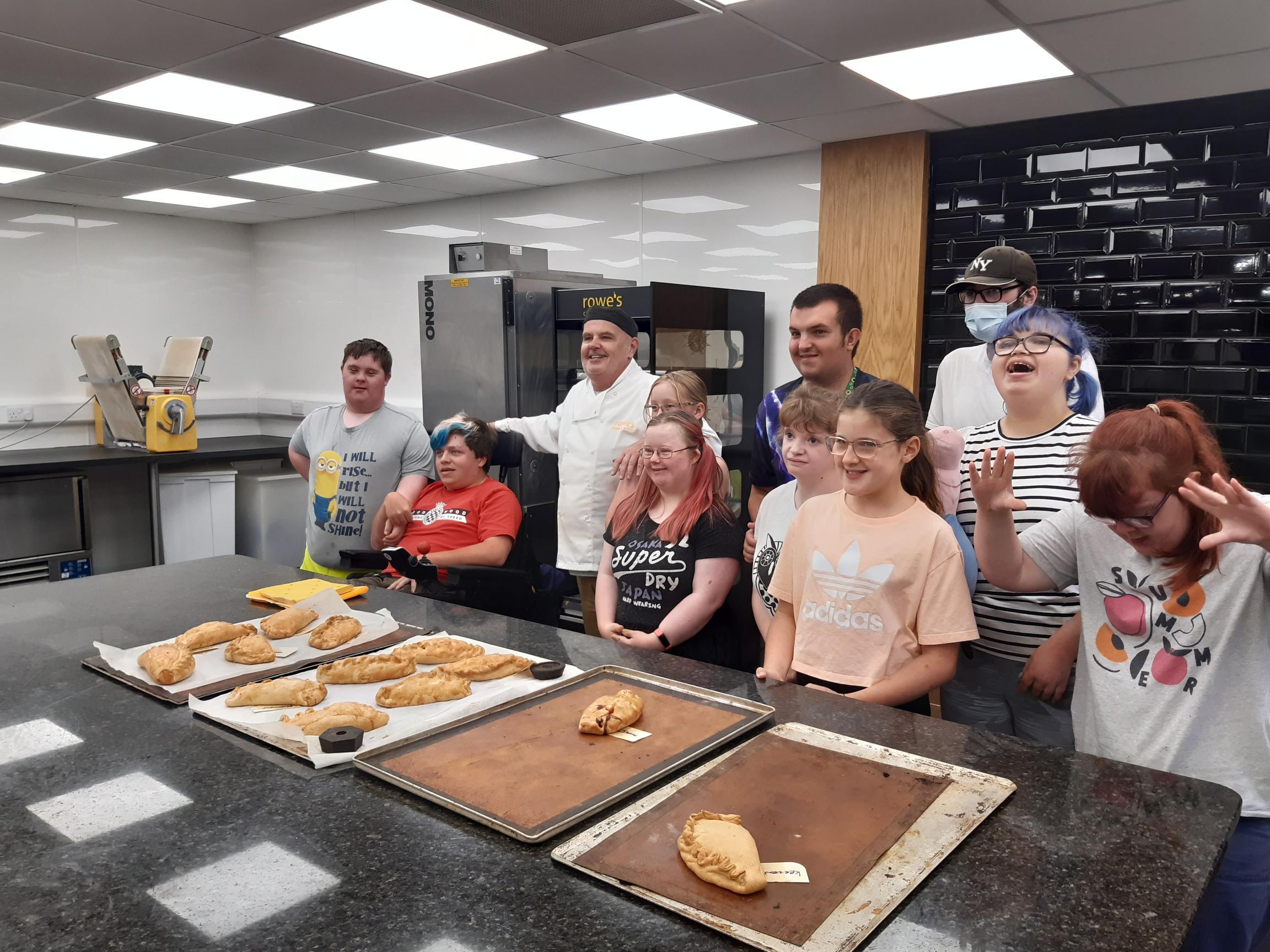 Delighted faces once their pasties had come out of the oven.