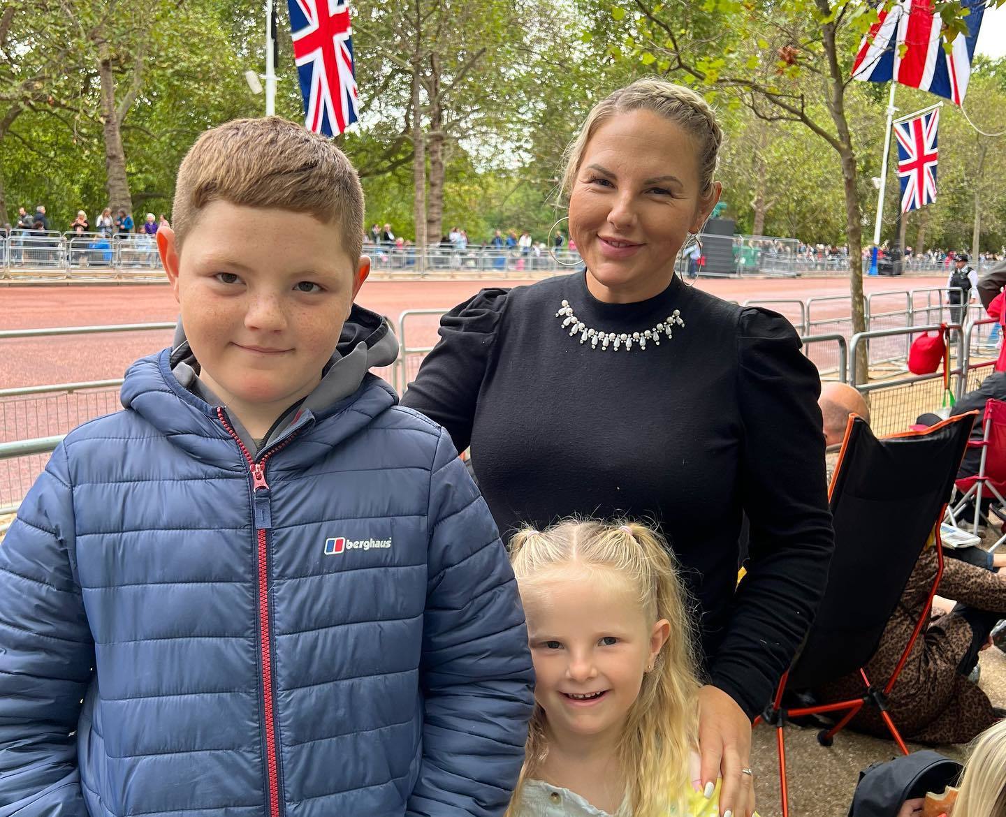 Rosie with her two children Tyler and Eliza waited to watch the procession in London on Wednesday. 