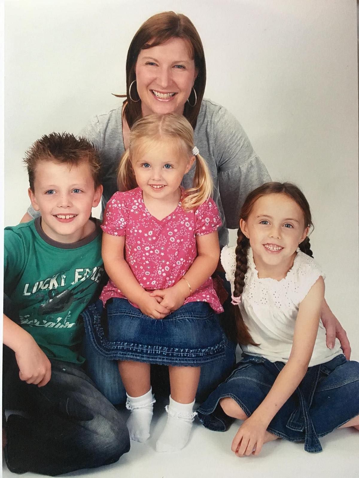 Clair with her three children, pictured in 2008/2009