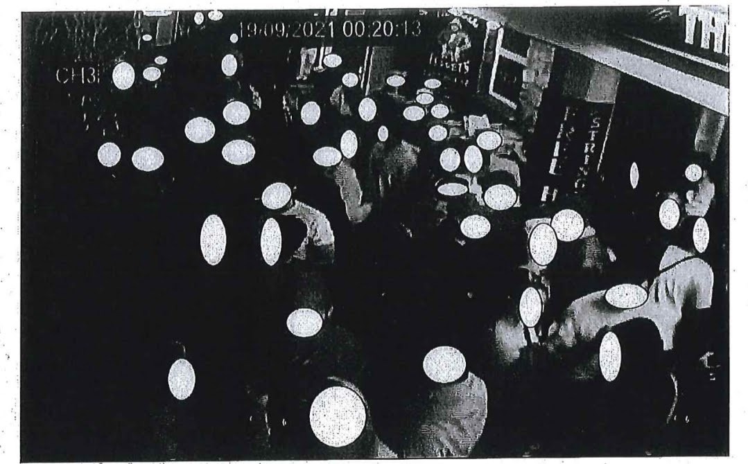 Screenshot of CCTV footage which shows a large number of people congregating and drinking outside the Three Ferrets pub in St Ives